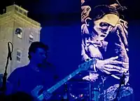 Mauro Pezzente playing bass guitar