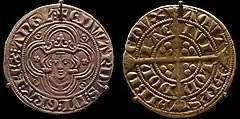 Two sides of a groat (coin) dating from the reign of Edward I. The left image shows its obverse, with a head with a coronet, representing King Edward. The surrounding text says, in abbreviated Latin, "Edward, by the grace of God King of England". The right image shows the reverse, which featured a cross and the text "Duke of Aquitaine and Lord of Ireland", and "Made in London".