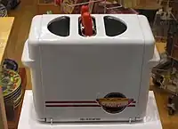 Toaster for hot dog buns that grills hot dogs at the same time
