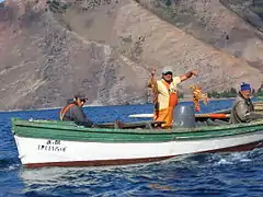 Chilean fishermen with lobsters