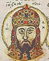 Head portrait of a middle-aged man with a dark, forked beard, wearing a golden, jewel-encrusted domed crown