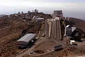 Ramps lead to the NTT. The Euler Telescope is to the right. (Seen from the ESO 3.6 Telescope.)