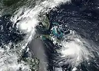 A satellite image of Hurricane Marco and Tropical Storm Laura on August 23, 2020.