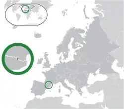 Location of Andorra (centre of green circle)in Europe (dark grey)