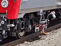 Contact shoe on Metro-North M8 railcar, designed for both over- and under-running third rail.