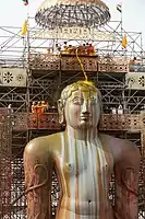 Gommateshwara statue during the Grand Consecration Mahamastakabhisheka in August 2018 at Shravanabelagola, Karnataka. Mahamastakabhisheka is held every 12 years and it is considered Jainism's one of the most auspicious festival or celebration.
