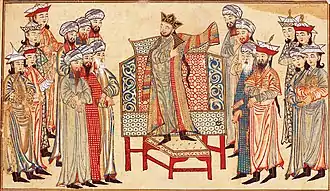 Sultan Mahmud of Ghazni receiving a richly decorated robe of honor from the caliph al-Qadir in 1000. Miniature from the Rashid al-Din's Jami‘ al-Tawarikh