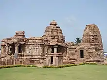 Photo of brown cone-topped temple ruins