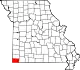 A state map highlighting McDonald County in the southwestern corner of the state.