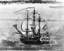  A sail warship at sea flying a US flag.