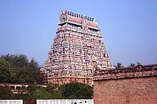 Gopuram of the Thillai Nataraja Temple, Chidambaram, Tamil Nadu, densely packed with rows of painted statues