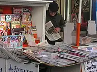 Newspaper vendor, Paddington, London, February 2005