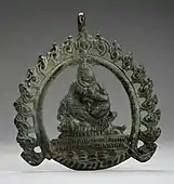 Pendant probably with Siddha; 8th–9th century; copper alloy; 8.89 x 7.93 x .31&nbsp;cm; Los Angeles County Museum of Art (Los Angeles)