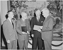 Secretary of Defense Marshall with President Truman and Princeton University President Harold W. Dodds at the Library of Congress. May 17, 1950.