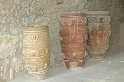 Three large, clay storage jars
