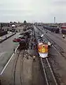 The L.A.-bound Super Chief gets its 5-minute pit-stop service in Albuquerque, 1943