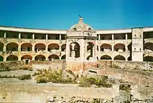 Photograph of the abandoned Santo Stefano prison