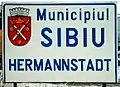 Bilingual Romanian-German sign at the entrance in Sibiu/Hermannstadt