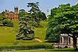 Hawkwell Hill with Gothic temple, Cobham monument and Palladian bridge at Stowe House in Buckinghamshire