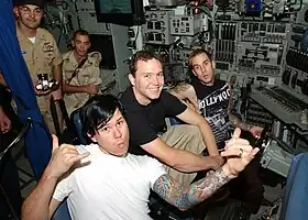 Left to right: Tom DeLonge, Mark Hoppus, and Travis Barker in 2003.