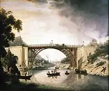 A painting of the bridge, from mid-river, in the picturesque style of the period. Smoking furnaces can be seen in the distance and a Severn trow is alongside the bridge. Two wealthy coaches are visible, as are a well-dressed party of sightseers in a small boat.