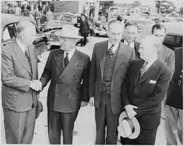 Secretary of Defense George C. Marshall greeting President Truman following Truman's return from the Wake Island Conference at Washington National Airport, October 18, 1950.