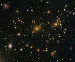 Gravitational lensing in the galaxy cluster Abell 370 (captured by the Hubble Space Telescope).jpg