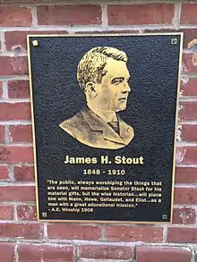 A black and gold plaque of James Stout that says how he'll always be remembered.